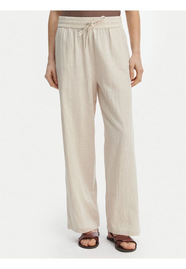only - ONLY Spodnie materiałowe Tizana 15319090 Beżowy Regular Fit. Kolor: beżowy. Materiał: bawełna
