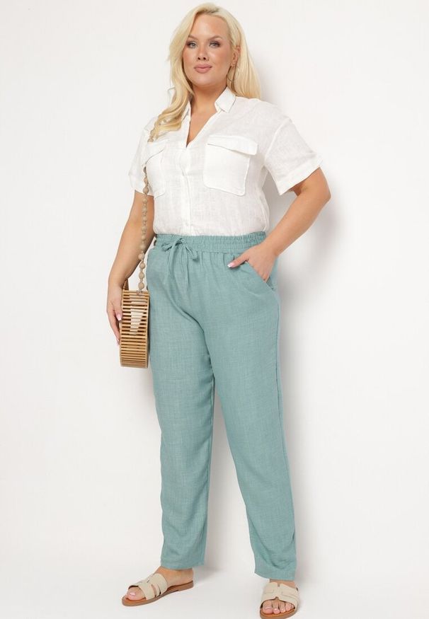 Born2be - Miętowe Spodnie z Wiązaniem w Pasie i Kieszeniami Truvolia. Okazja: na co dzień, na spotkanie biznesowe. Kolor: miętowy. Styl: biznesowy, elegancki, casual