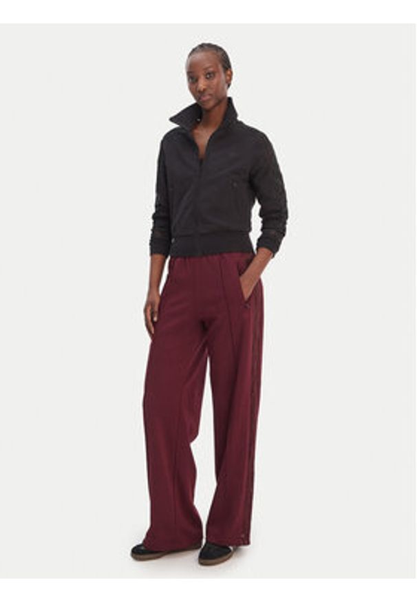 Adidas - adidas Spodnie dresowe Firebird Lace KC6445 Bordowy Loose Fit. Kolor: czerwony. Materiał: syntetyk, bawełna