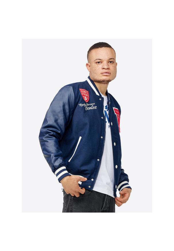 Kurtka puchowa Benlee Newark. Kolor: niebieski. Materiał: puch. Sport: turystyka piesza