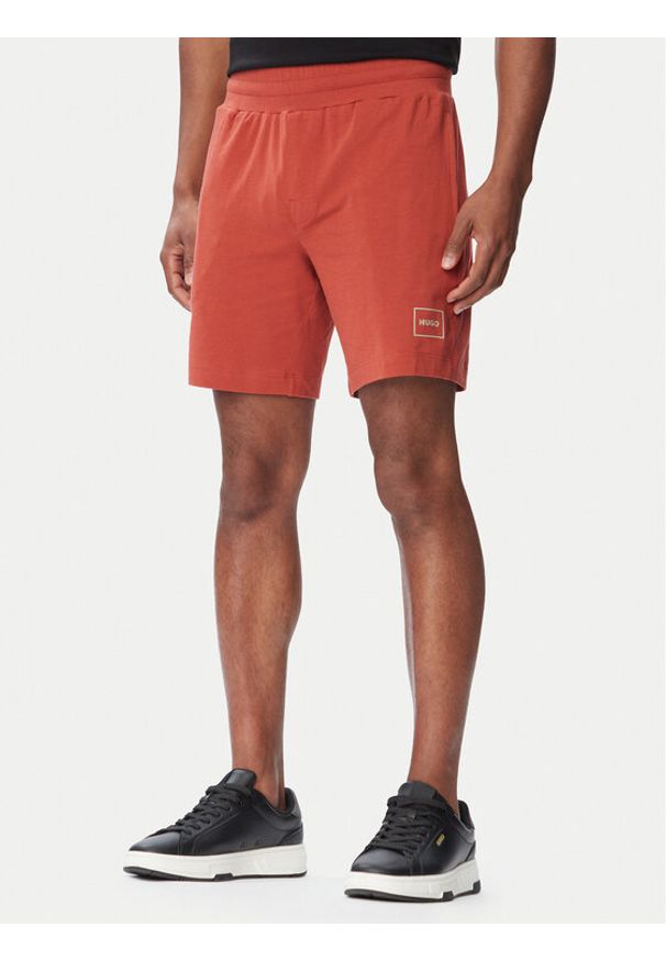 Hugo - HUGO Szorty sportowe Laze 50525247 Różowy jasny Regular Fit. Kolor: różowy. Materiał: bawełna. Styl: sportowy