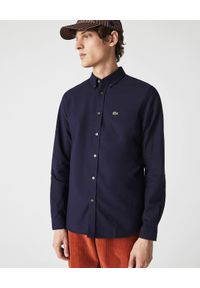 Lacoste - LACOSTE - Elegancka granatowa koszula z logo Oxford Regular Fit. Kolor: niebieski. Materiał: jeans, bawełna. Wzór: haft. Styl: elegancki #1