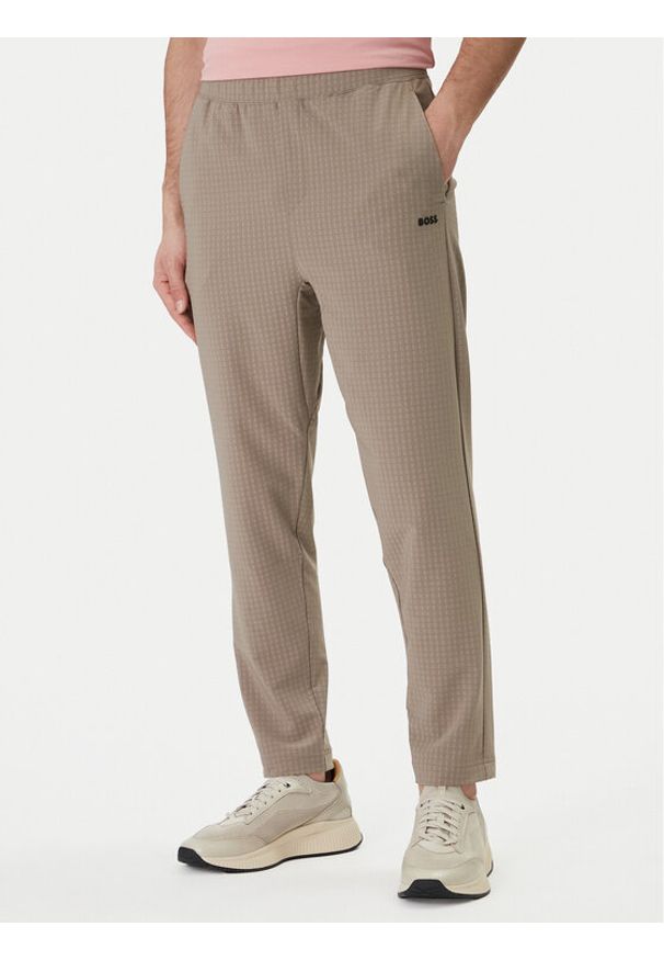 BOSS Spodnie materiałowe Terrace 50558503 Beżowy Tapered Fit. Kolor: beżowy. Materiał: syntetyk