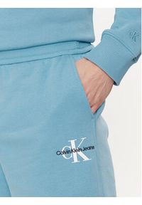 Calvin Klein Jeans Szorty sportowe Monologo J30J325131 Niebieski Regular Fit. Kolor: niebieski. Materiał: syntetyk. Styl: sportowy #4
