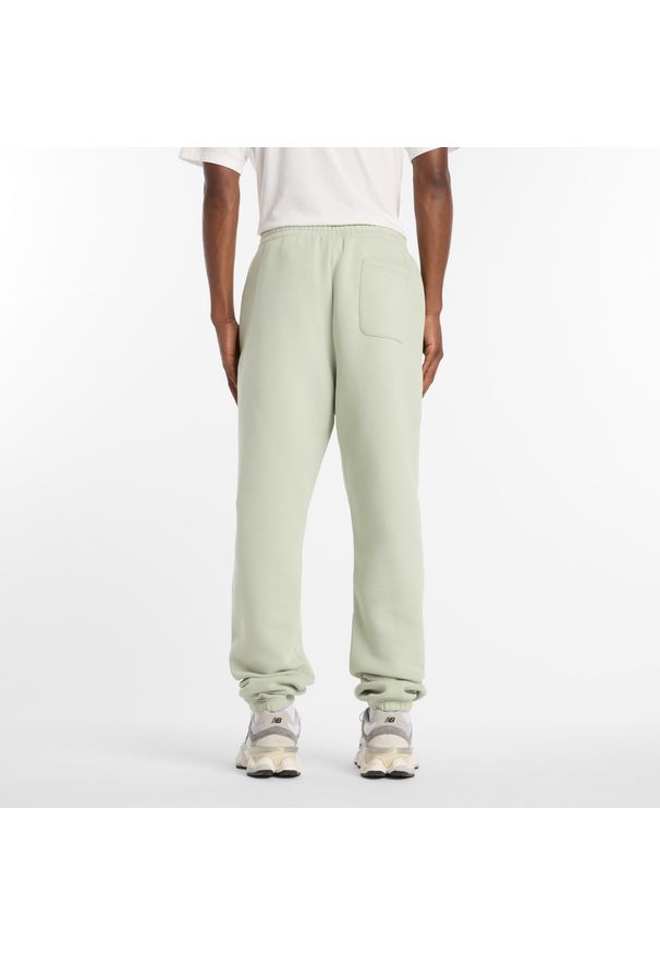 Spodnie męskie New Balance MP41503GAS – miętowe. Kolor: miętowy. Materiał: bawełna, dresówka, materiał, poliester