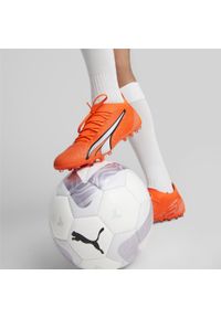Buty piłkarskie męskie Puma Ultra Match Mg. Zapięcie: sznurówki. Kolor: pomarańczowy. Materiał: materiał. Szerokość cholewki: normalna. Sport: piłka nożna