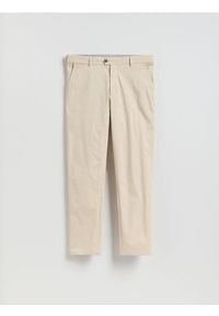 Reserved - Spodnie chino slim fit - beżowy. Kolor: beżowy. Materiał: tkanina, bawełna #1
