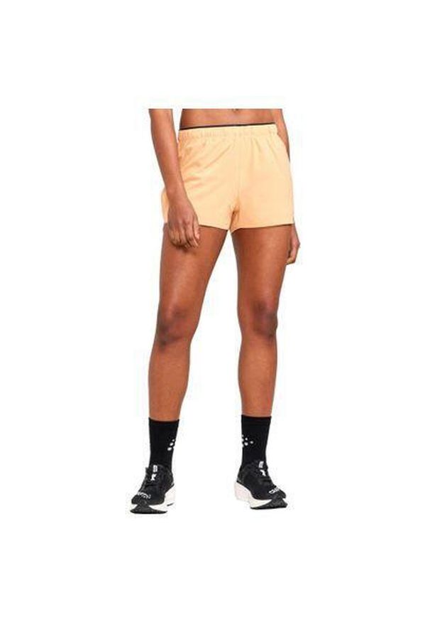 Damskie szorty ze stretchem Craft ADV Essence 2". Kolor: pomarańczowy, różowy, wielokolorowy. Długość: krótkie. Sport: fitness, outdoor
