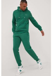 Superdry spodnie dresowe męskie kolor zielony melanżowe. Kolor: zielony. Materiał: dresówka. Wzór: melanż