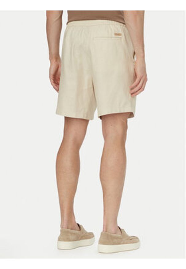 Calvin Klein Szorty materiałowe LV04LF620G Beżowy jasny Straight Fit. Kolor: beżowy. Materiał: bawełna
