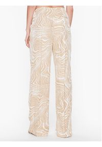 Calvin Klein Spodnie materiałowe Wave Print Wide K20K205220 Beżowy Regular Fit. Kolor: beżowy. Materiał: materiał, wiskoza. Wzór: nadruk
