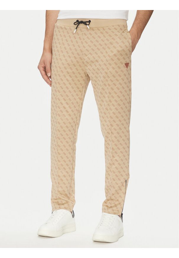 Guess Spodnie dresowe Korbin Z2BB05 FL04Q Beżowy Regular Fit. Kolor: beżowy. Materiał: bawełna, syntetyk