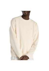 Bluza męska New Balance MT41506PEF - beżowa. Kolor: beżowy. Materiał: prążkowany, bawełna. Wzór: aplikacja. Styl: klasyczny #1