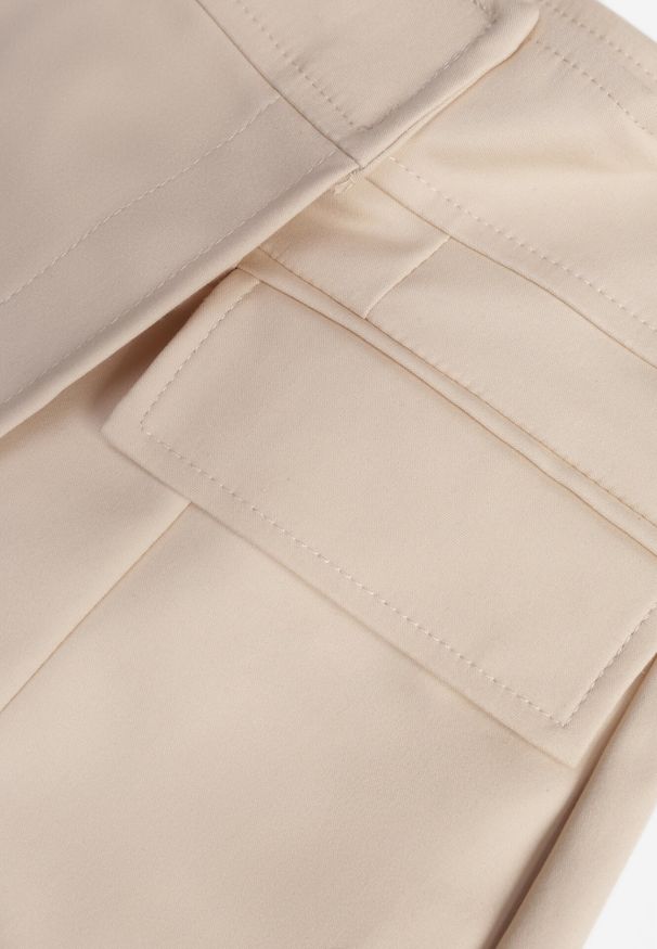 Born2be - Beżowe Spódnico-Szorty z Bawełną Ozdobione Imitacją Kieszeni Tinorina. Okazja: na co dzień. Kolor: beżowy. Materiał: bawełna. Wzór: aplikacja. Styl: casual