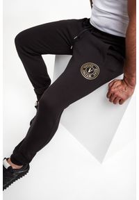 Versace Jeans Couture - Spodnie dresowe VERSACE JEANS COUTURE. Materiał: dresówka. Wzór: nadruk #2
