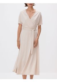 Reserved - Sukienka midi z modalem - kremowy. Kolor: kremowy. Materiał: dzianina. Długość: midi #1