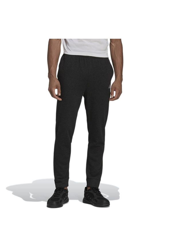 Adidas - Spodnie adidas Essentials French Terry Melange Joggers HE1794 - czarne. Kolor: czarny. Materiał: wiskoza, materiał, bawełna, dresówka, poliester