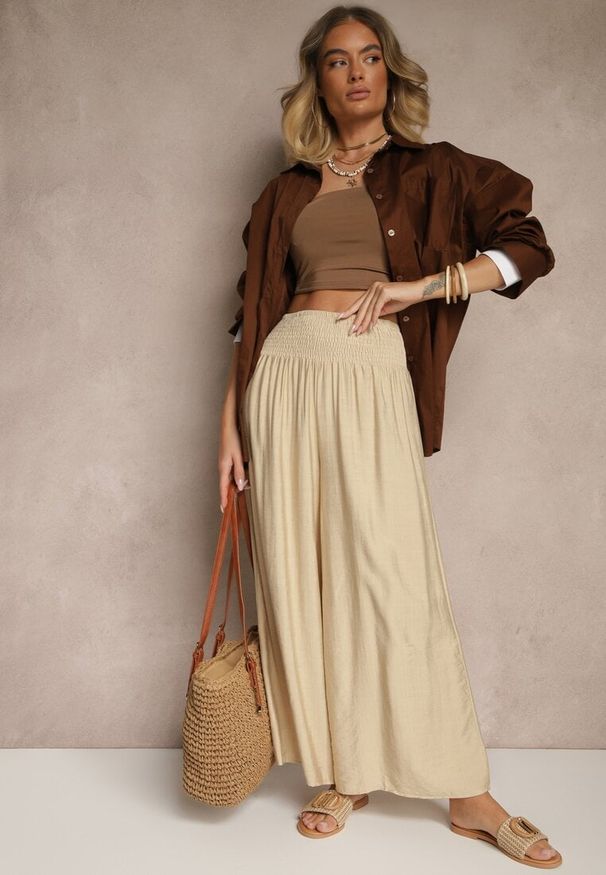 Renee - Beżowe Spodnie z Wiskozą o Szerokim Kroju High Waist Orrana. Okazja: na co dzień. Stan: podwyższony. Kolor: beżowy. Materiał: wiskoza. Styl: elegancki, casual
