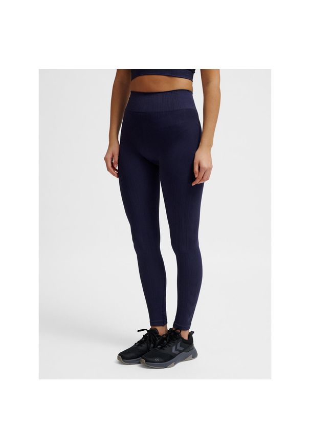 Damskie legginsy bezszwowe Hummel Define. Kolor: niebieski, zielony, wielokolorowy. Sport: joga i pilates