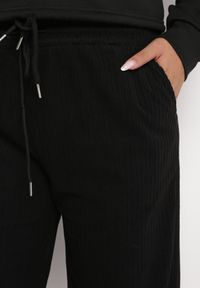 Born2be - Czarne Szerokie Spodnie z Gumką w Pasie i Wsuwanymi Kieszeniami z Wysokim Stanem Seliduna. Stan: podwyższony. Kolor: czarny #5
