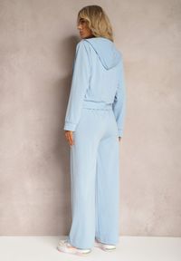 Renee - Niebieski Komplet Dresowy o Luźnym Kroju Bluza na Suwak z Kapturem i Spodnie Szerokie Ezorila. Kolor: niebieski. Materiał: dresówka