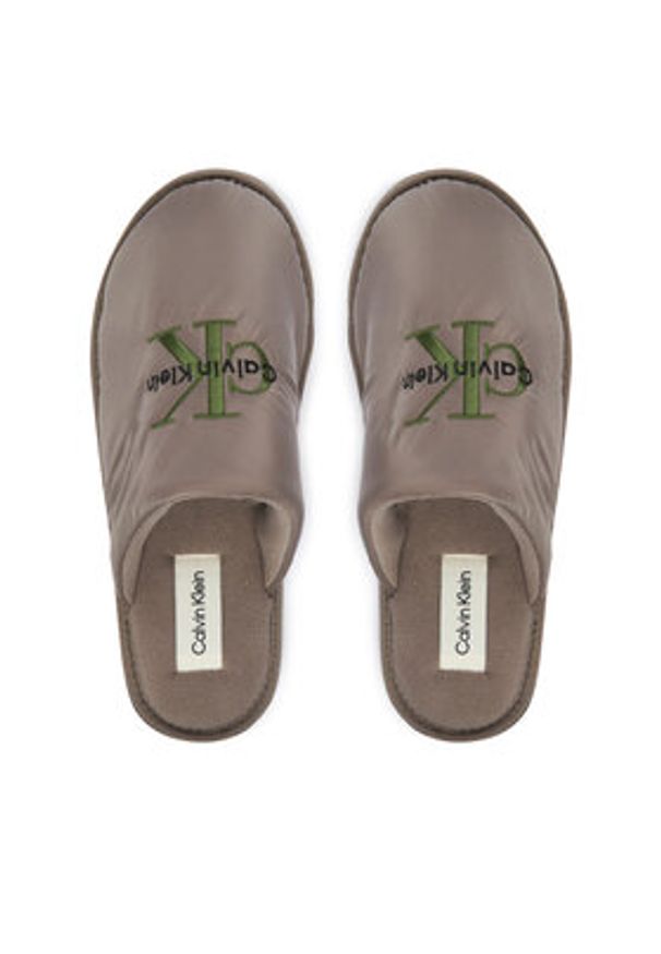 Calvin Klein Kapcie YM0YM01392 Beżowy. Kolor: beżowy. Materiał: materiał