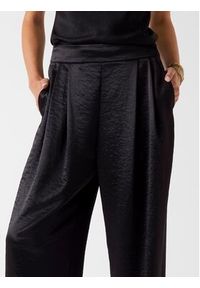 Guess Spodnie materiałowe 180020 Czarny Slim Fit. Kolor: czarny. Materiał: materiał #2