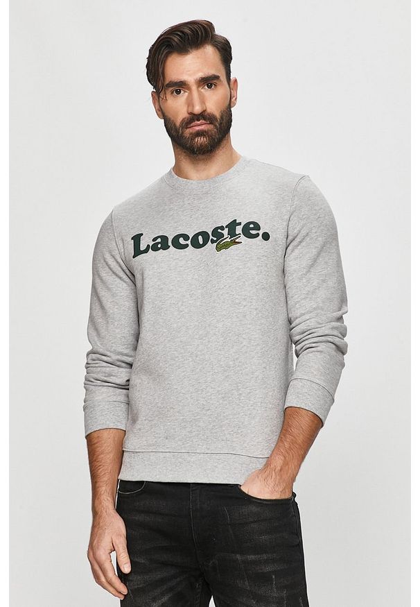 Lacoste - Bluza. Okazja: na co dzień. Typ kołnierza: bez kaptura. Kolor: srebrny. Materiał: bawełna, dzianina, elastan. Wzór: nadruk. Styl: casual