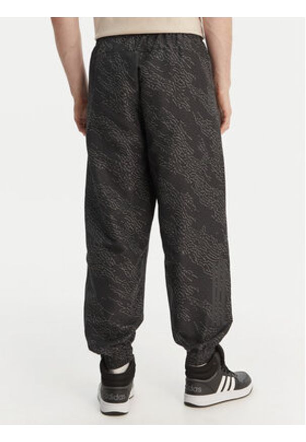 Adidas - adidas Spodnie dresowe PrimeLift Workout KA1202 Szary Loose Fit. Kolor: szary. Materiał: syntetyk