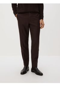 Reserved - Garniturowe spodnie z wełną - brązowy. Kolor: brązowy. Materiał: wełna. Wzór: gładki #1