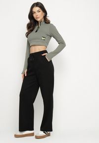 Born2be - Czarne Spodnie Dresowe Szerokie z Wiskozą Elaniris. Okazja: na co dzień. Kolor: czarny. Materiał: wiskoza, dresówka. Długość: do kostek. Styl: casual, elegancki #5