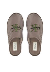 Calvin Klein Kapcie YM0YM01392 Beżowy. Kolor: beżowy. Materiał: materiał #4
