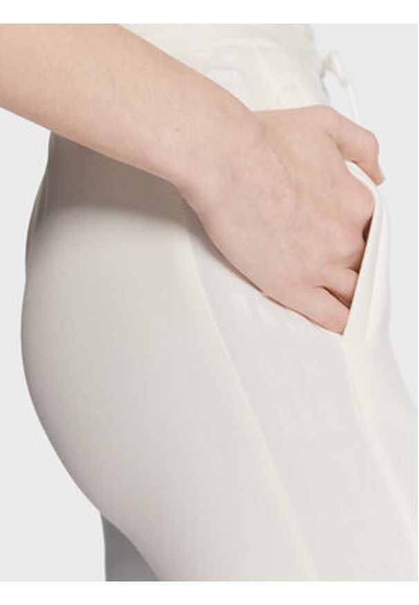 Guess Spodnie dresowe V3RB21 K7UW2 Écru Regular Fit. Materiał: wiskoza