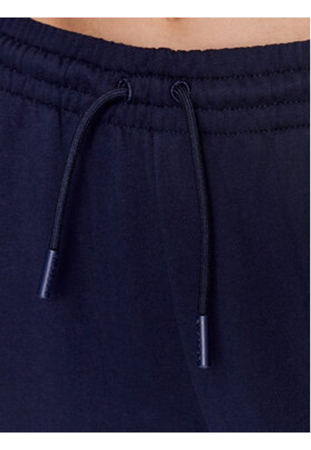 Lacoste Spodnie dresowe XF9216 Granatowy Regular Fit. Kolor: niebieski. Materiał: bawełna