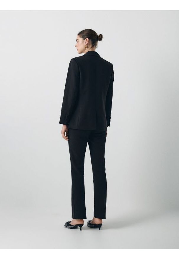Reserved - Spodnie z ozdobnymi wstawkami - czarny. Kolor: czarny. Materiał: tkanina, wiskoza. Wzór: gładki