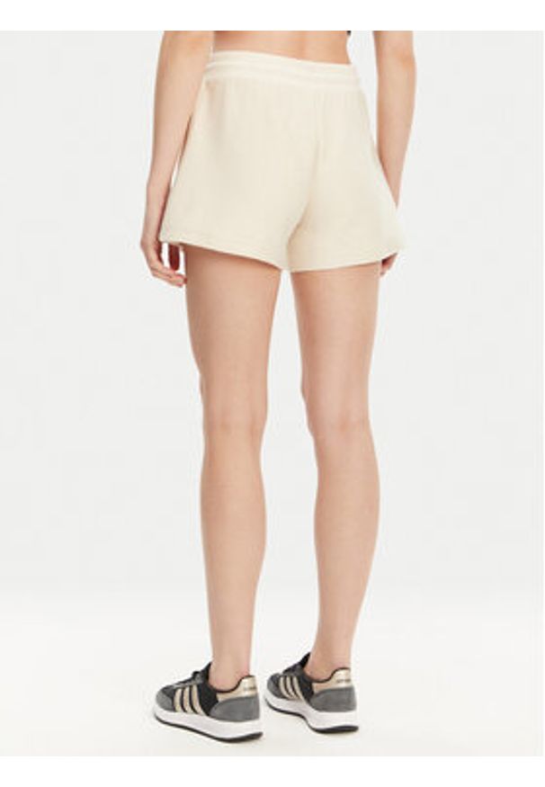 Puma Szorty sportowe Ess 629782 Beżowy Regular Fit. Kolor: beżowy. Materiał: bawełna