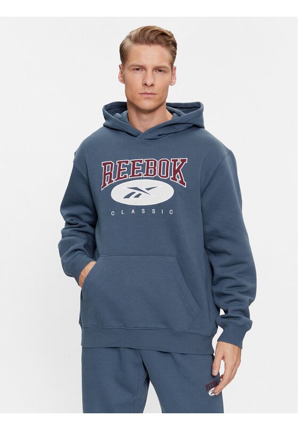 Reebok Bluza Archive Essentials IM1528 Niebieski Regular Fit. Kolor: niebieski. Materiał: bawełna
