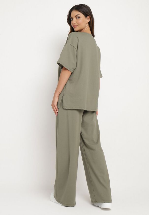 Born2be - Ciemnozielony Bawełniany Komplet Bluzka z Rozcięciami po Bokach Szerokie Spodnie z Gumką w Pasie Undrea. Kolor: zielony. Materiał: bawełna