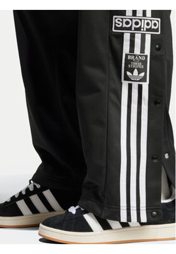 Adidas - adidas Spodnie dresowe Adibreak IW3482 Czarny Loose Fit. Kolor: czarny. Materiał: syntetyk