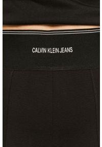 Calvin Klein Jeans - Legginsy. Kolor: czarny. Materiał: elastan, dzianina, poliamid, wiskoza. Wzór: gładki #3