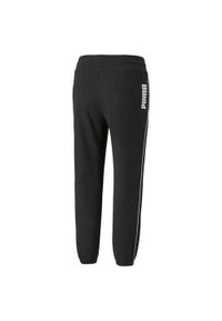 Spodnie sportowe damskie Puma 84711101. Kolor: czarny. Materiał: dresówka. Długość: długie