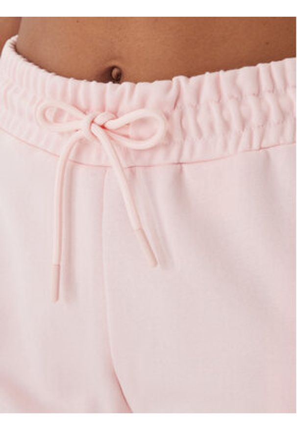 Guess Spodnie dresowe V6GB11 K3095 Różowy Regular Fit. Kolor: różowy. Materiał: bawełna