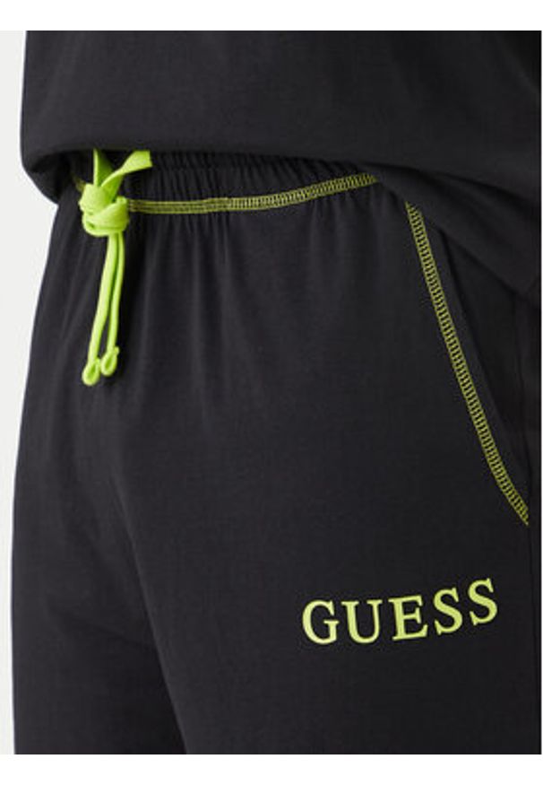Guess Piżama U6GX03 KCAM1 Czarny Regular Fit. Kolor: czarny. Materiał: bawełna