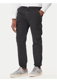 Tommy Jeans Joggery Austin DM0DM21791 Czarny Slim Fit. Kolor: czarny. Materiał: bawełna