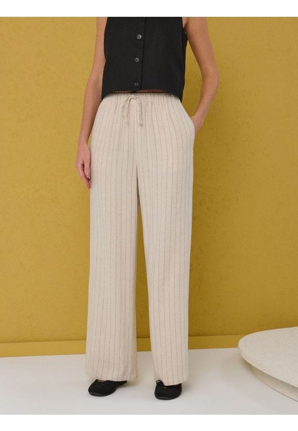 Sinsay - Spodnie palazzo z domieszką lnu - kremowy. Kolor: kremowy. Materiał: len