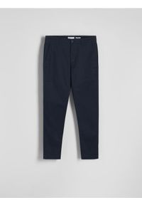 Reserved - Spodnie chino slim fit - granatowy. Kolor: niebieski. Materiał: tkanina, bawełna #1
