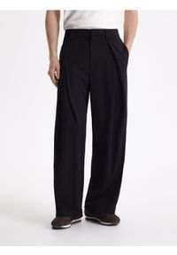 Reserved - Spodnie loose fit - czarny. Kolor: czarny. Materiał: tkanina, wiskoza #1