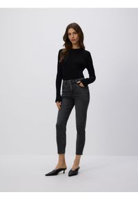 Reserved - Jeans slim fit mid rise - turkusowy. Kolor: turkusowy