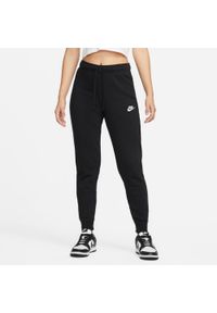 Nike - Spodnie Mid-Rise Slim Rozmiar M Różowy - DQ5174-690. Kolor: różowy. Materiał: materiał. Sport: fitness