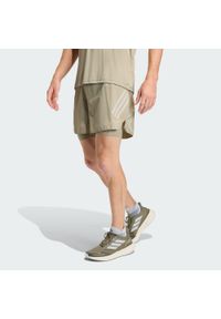 Adidas - Szorty adi365 FORMOTION 2in1. Kolor: beżowy. Sport: fitness #1